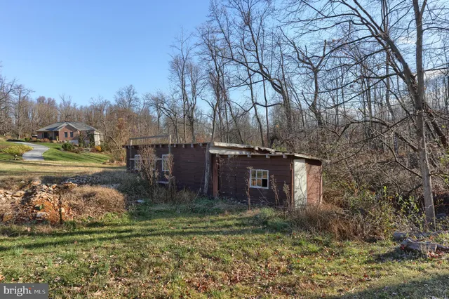 a view of a town with mountains in the background