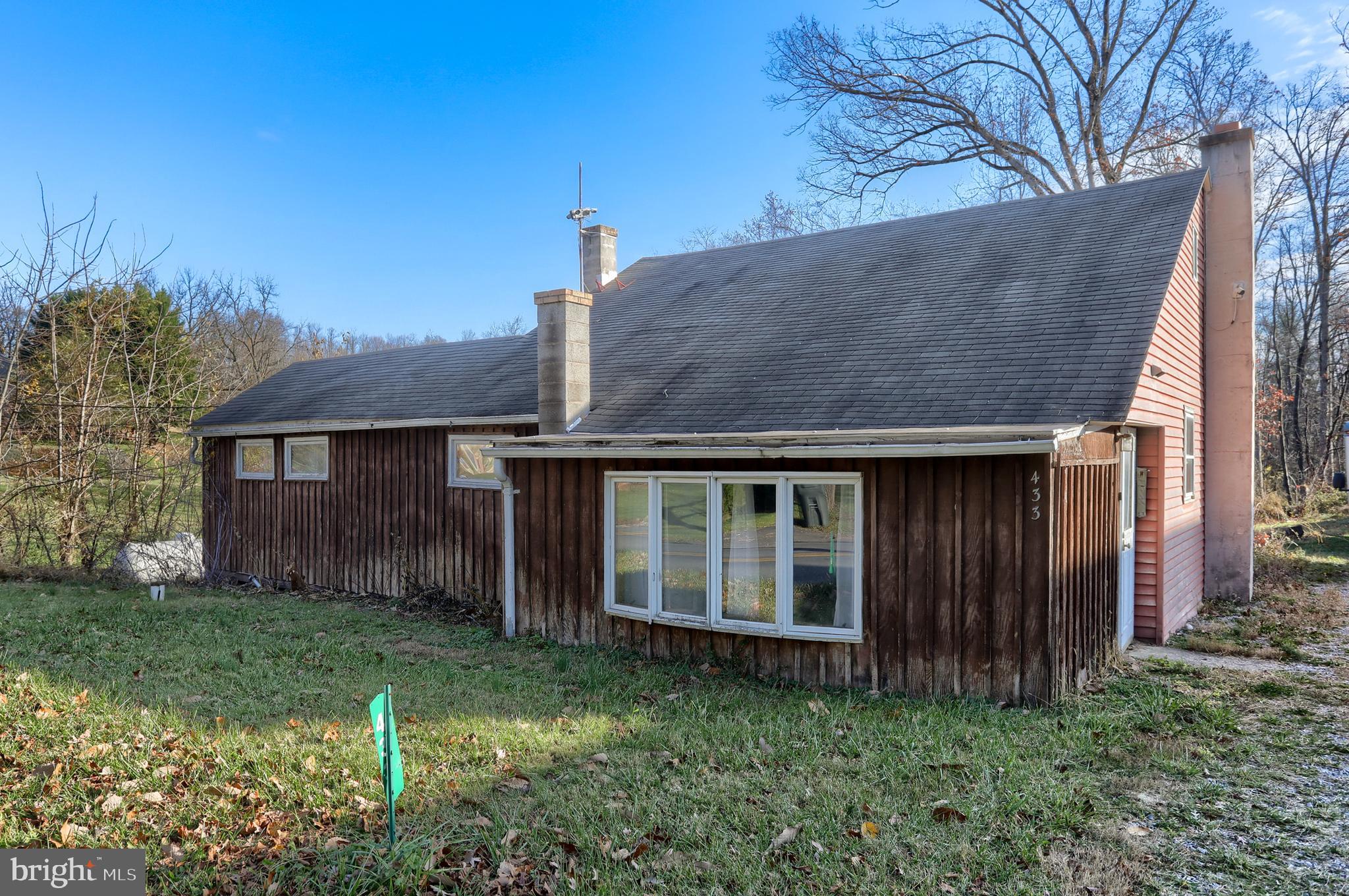 433 Sheep Hill Road Newmanstown, PA 17073 - Photo 3 of 35 a view of a house with yard and a garden