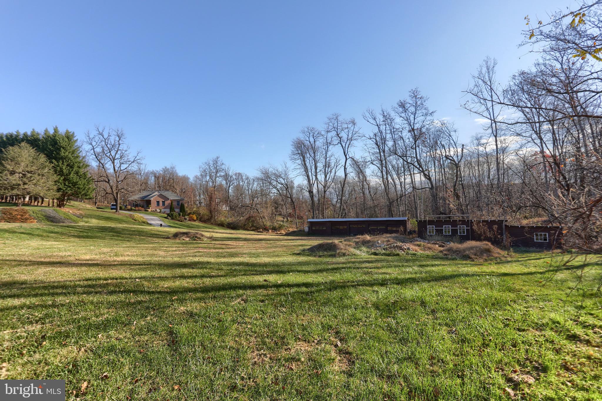433 Sheep Hill Road Newmanstown, PA 17073 - Photo 5 of 35 a view of a fountain in front of the house