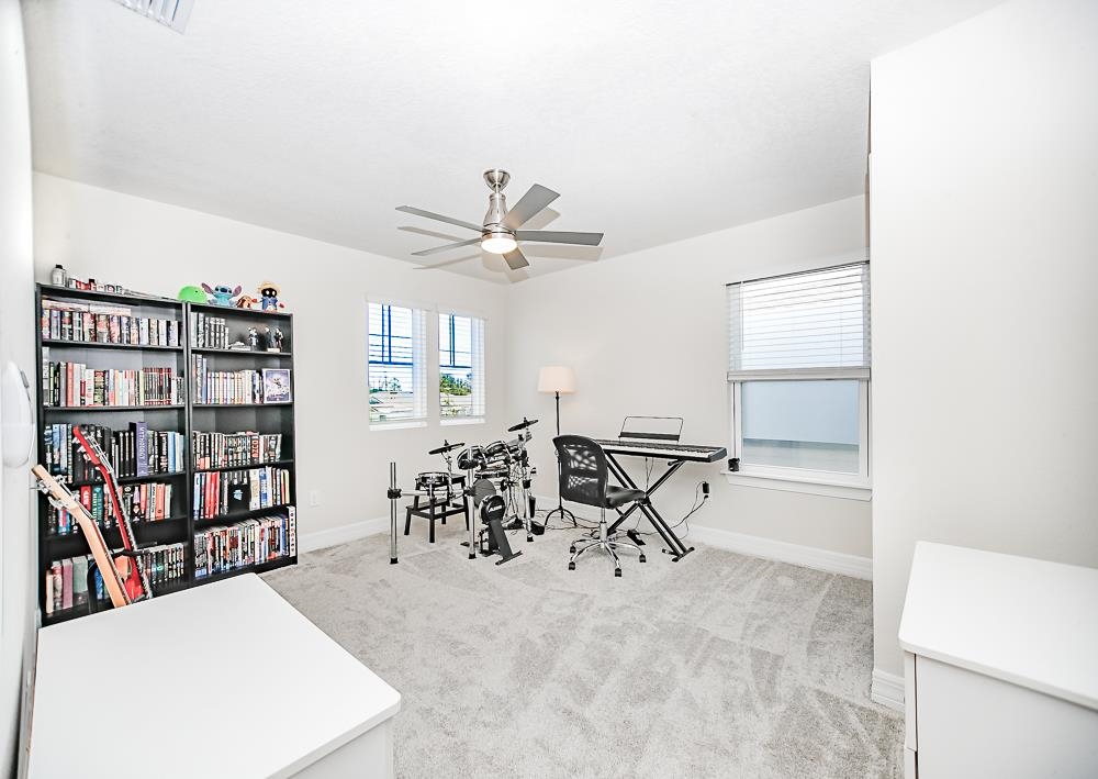 233 Red Barn Road St. Augustine, FL 32092 - Photo 15 of 40 walk in closet with a book shelf on the wall