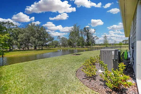 a view of a lake with a garden