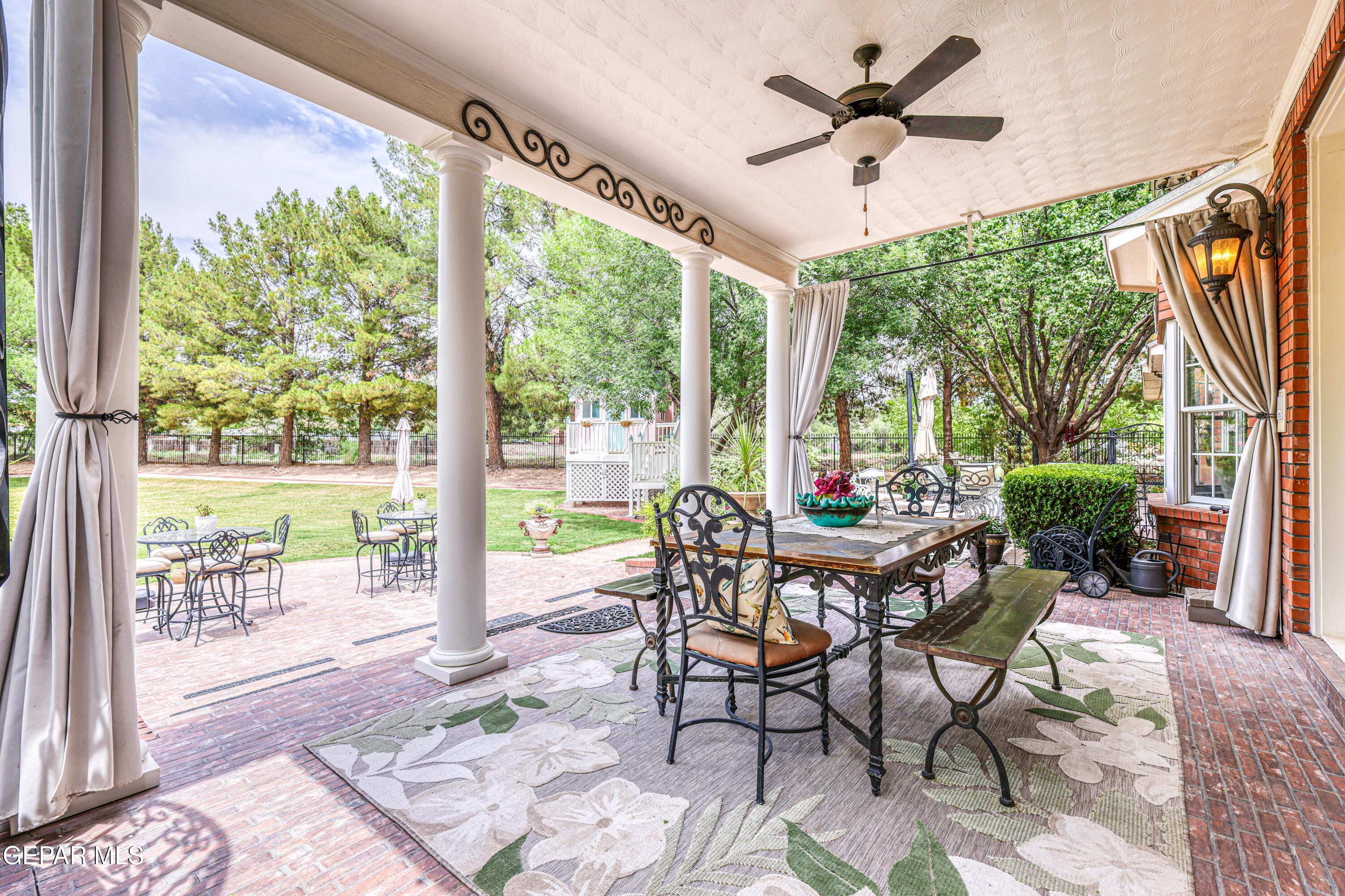 501 Country Club Road El Paso, TX 79932 - Photo 76 of 88 a dining room with furniture garden view and a large window