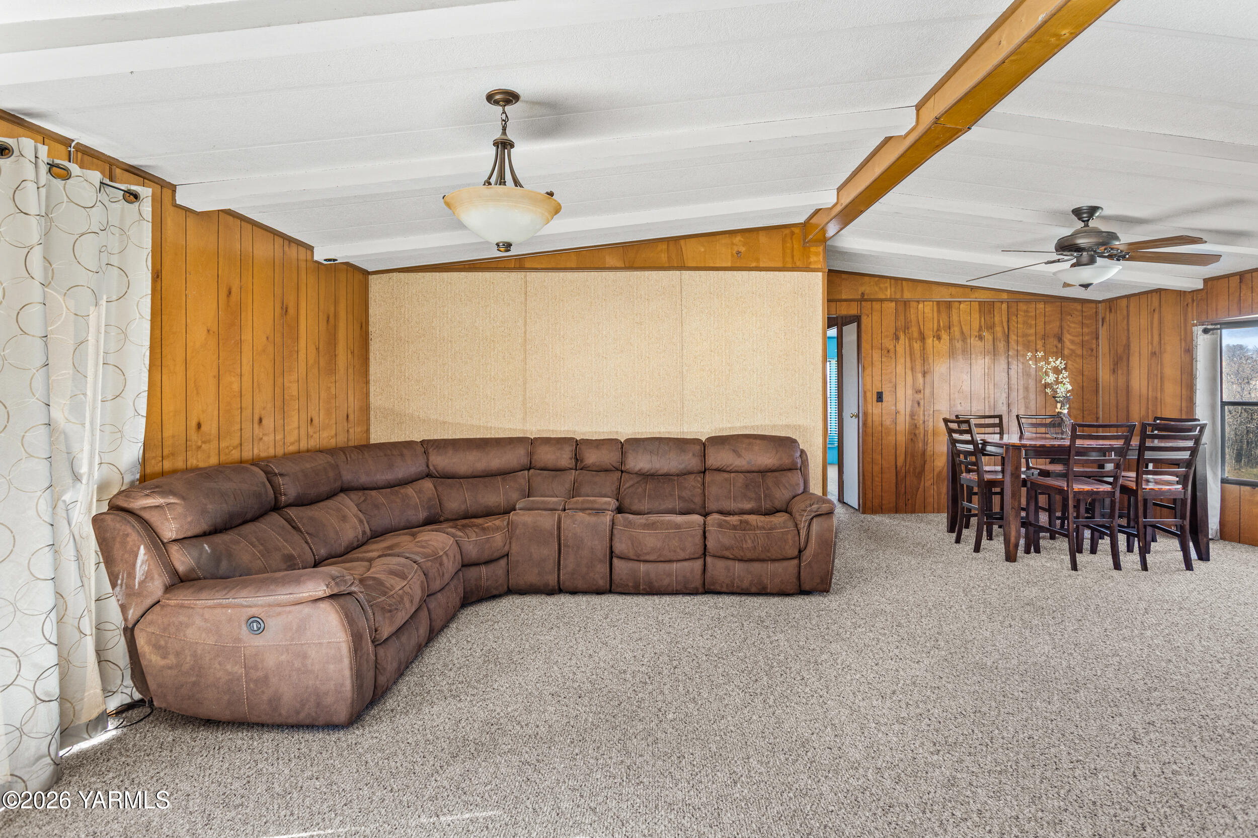 142 Foster Lane Selah, WA 98942 - Photo 9 of 21 a living room with furniture and a large window