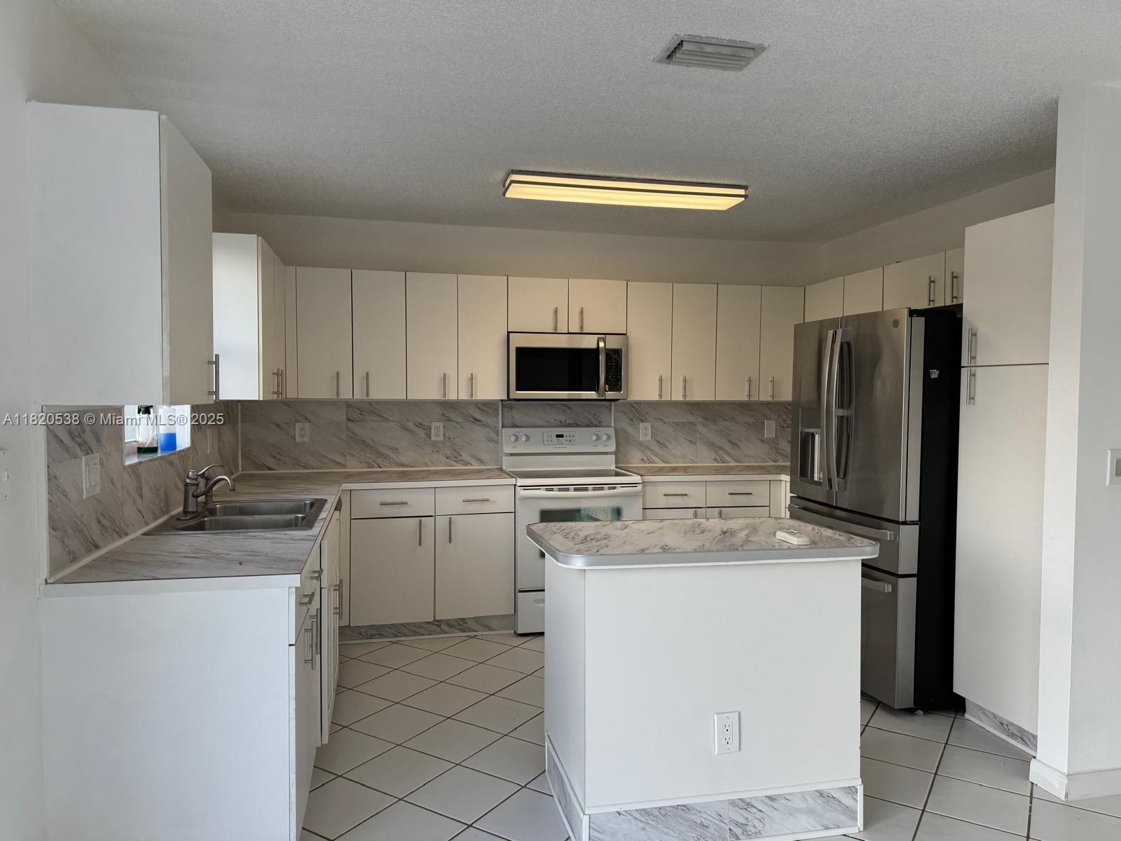 12149 Northwest 34th Street, Unit 12149 Sunrise, FL 33323 - Photo 6 of 33