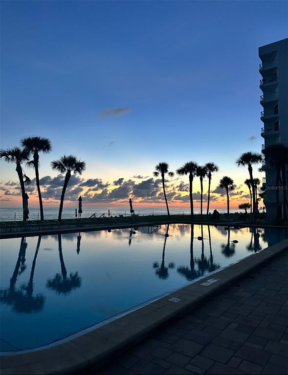 1050 Longboat Club Road, Unit 901 Longboat Key, FL 34228 - Photo 27 of 37 a view of swimming pool with an outdoor seating