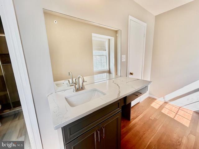 1409 Winding Waye Lane Silver Spring, MD 20902 - Photo 37 of 73 a bathroom with a sink a vanity and a mirror