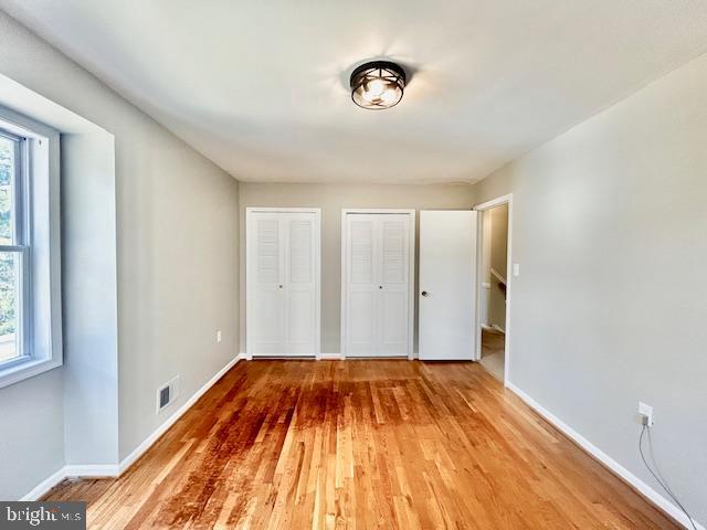 1409 Winding Waye Lane Silver Spring, MD 20902 - Photo 40 of 73 a view of a room with wooden floor