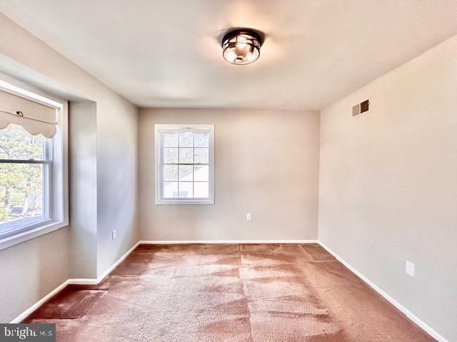 1409 Winding Waye Lane Silver Spring, MD 20902 - Photo 47 of 73 an empty room with a window