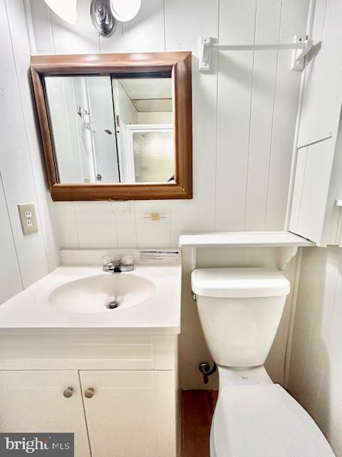 1409 Winding Waye Lane Silver Spring, MD 20902 - Photo 57 of 73 a bathroom with a toilet sink and mirror