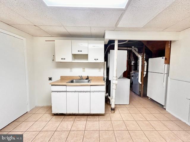 1409 Winding Waye Lane Silver Spring, MD 20902 - Photo 63 of 73 a kitchen with a stove a refrigerator and cabinets