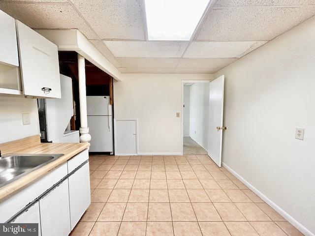 1409 Winding Waye Lane Silver Spring, MD 20902 - Photo 64 of 73 a view of a kitchen with a sink and an empty room