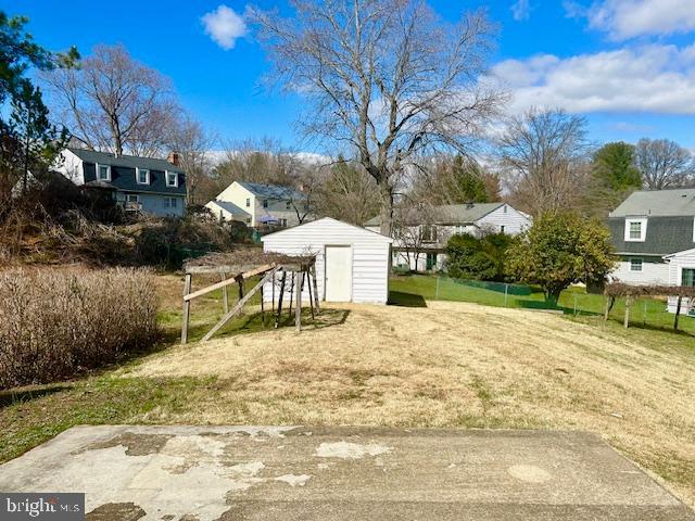1409 Winding Waye Lane Silver Spring, MD 20902 - Photo 65 of 73 a view of a backyard with sitting area