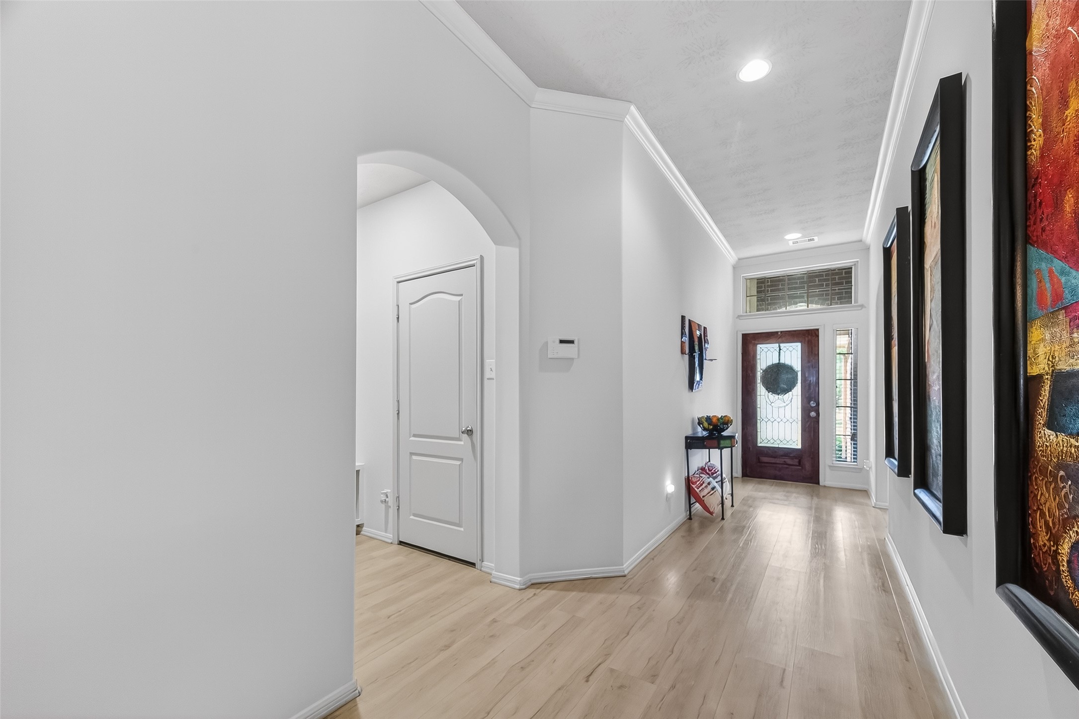 13415 Star Creek Lane Rosharon, TX 77583 - Photo 4 of 46 a view of a hallway view with wooden floor and staircase