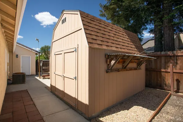 a view of a room with racks on the wall