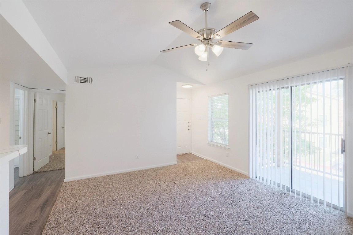 2323 Wells Branch Parkway, Unit A205 Austin, TX 78728 - Photo 5 of 22 a view of an empty room with a window