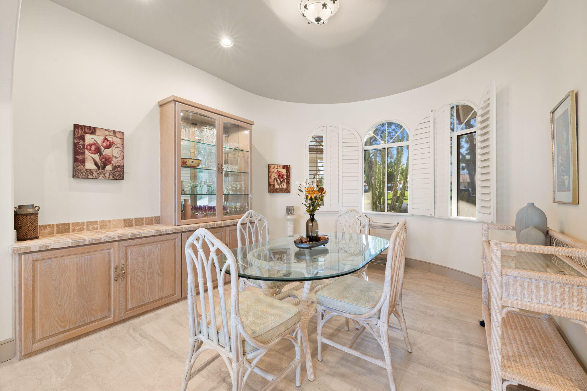 73110 Calliandra Street Palm Desert, CA 92260 - Photo 16 of 67 a view of a dining room with furniture window and outside view