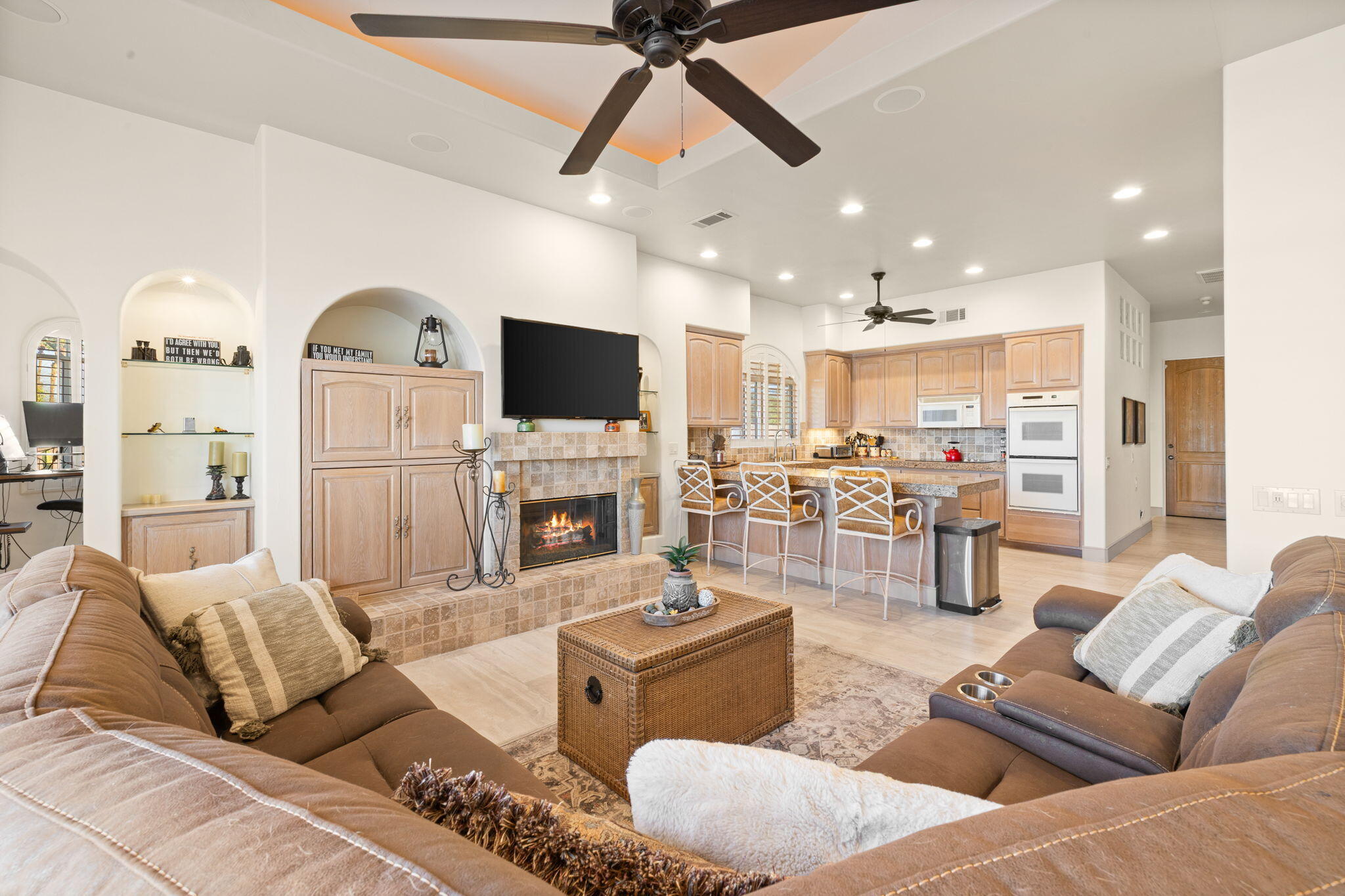 73110 Calliandra Street Palm Desert, CA 92260 - Photo 24 of 67 a living room with furniture and a flat screen tv