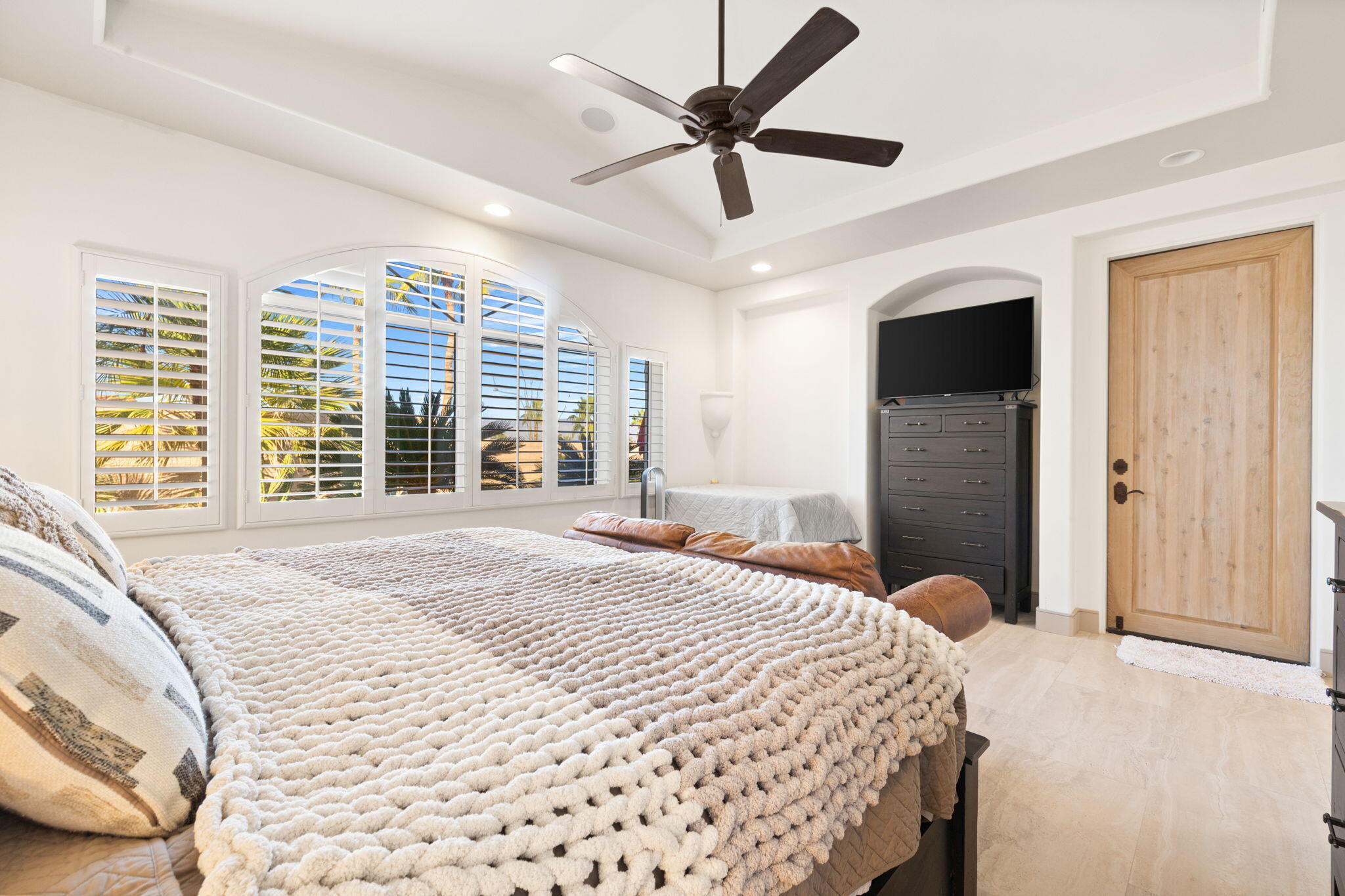 73110 Calliandra Street Palm Desert, CA 92260 - Photo 36 of 67 a bedroom with a large bed and a large window