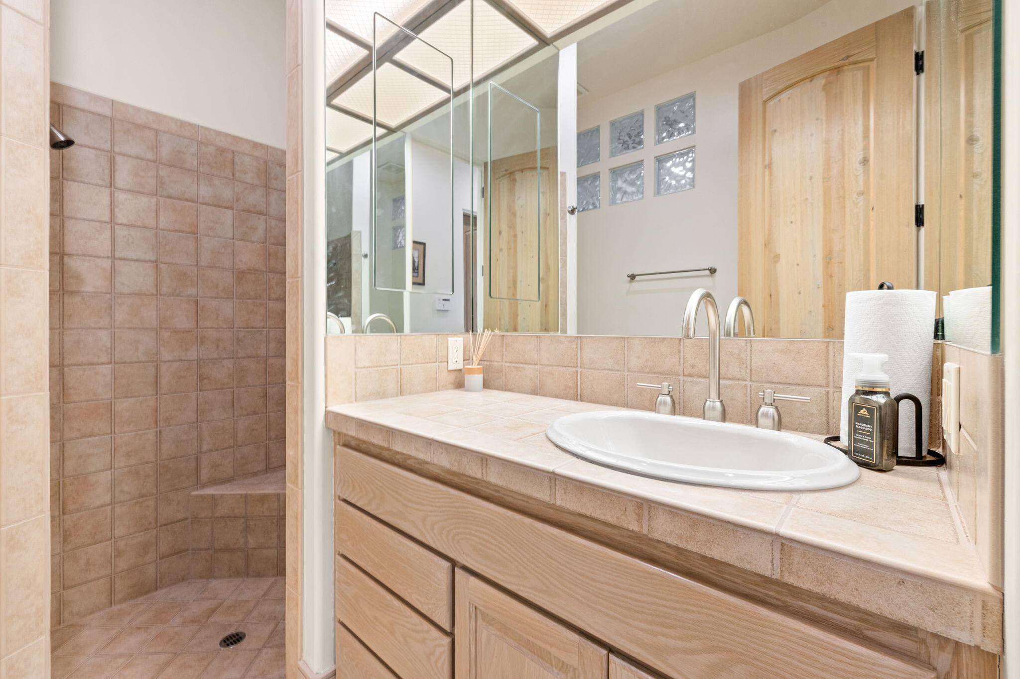 73110 Calliandra Street Palm Desert, CA 92260 - Photo 43 of 67 a bathroom with a sink and a mirror