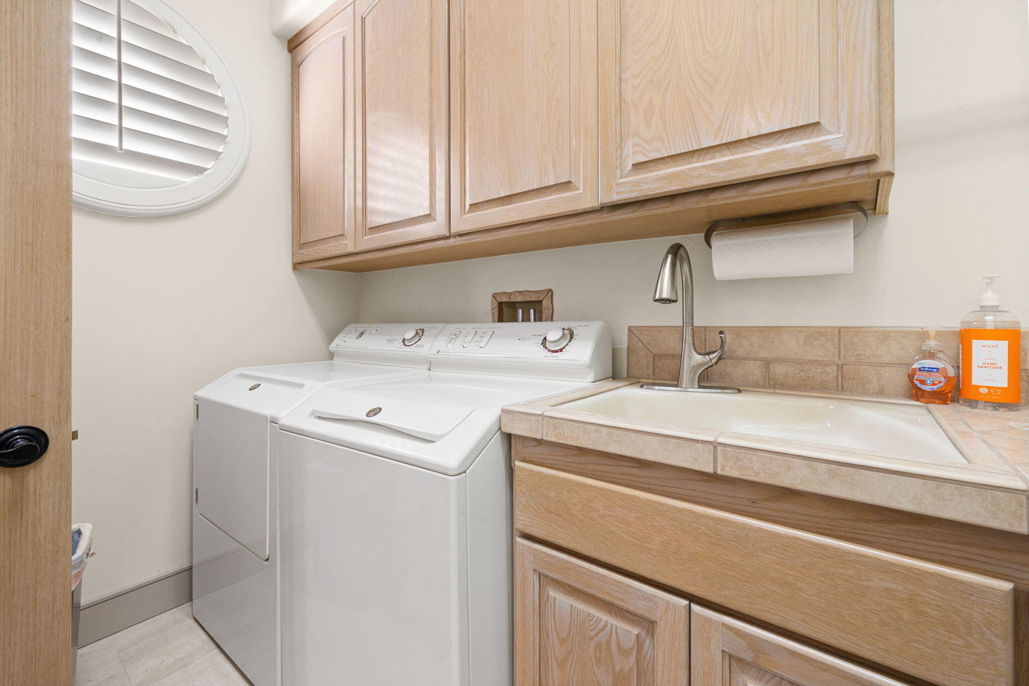 73110 Calliandra Street Palm Desert, CA 92260 - Photo 44 of 67 a utility room with dryer and washer
