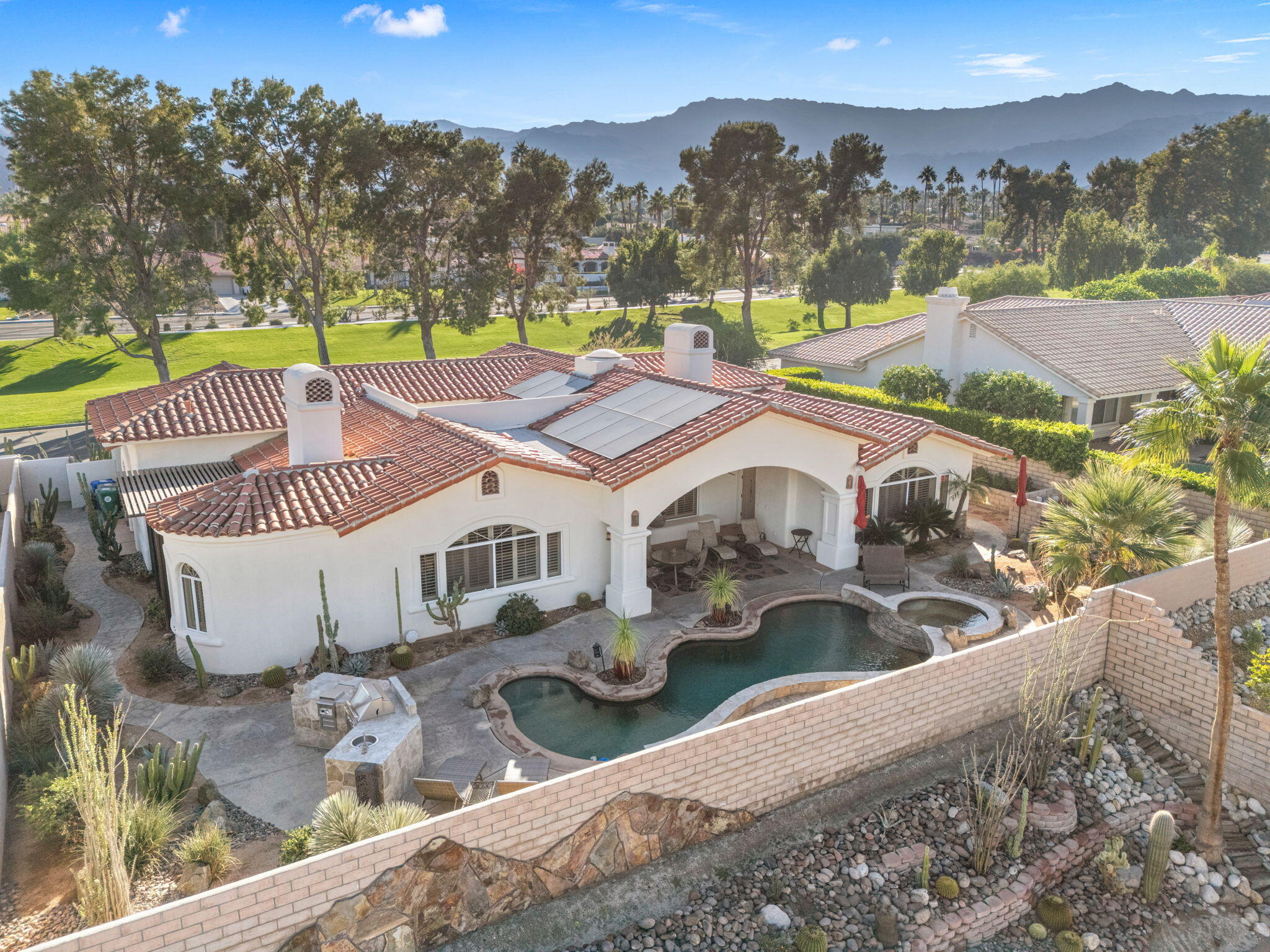 73110 Calliandra Street Palm Desert, CA 92260 - Photo 63 of 67 a view of a house with outdoor space and sitting area