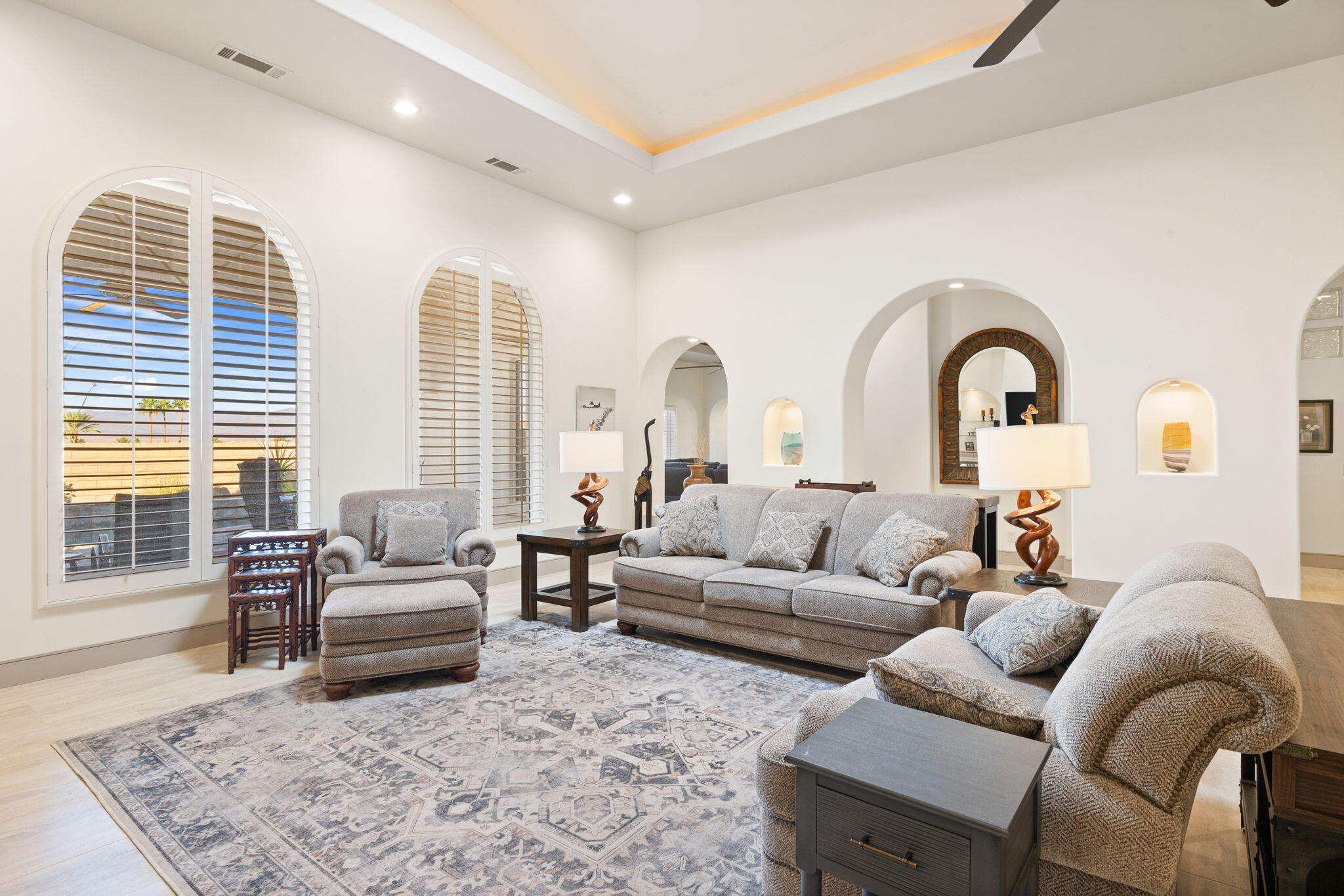 73110 Calliandra Street Palm Desert, CA 92260 - Photo 9 of 67 a living room with furniture and a large window