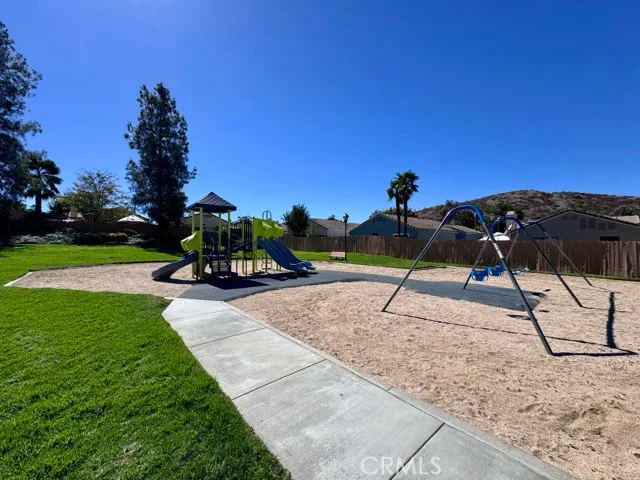 a view of a yard with palm tree