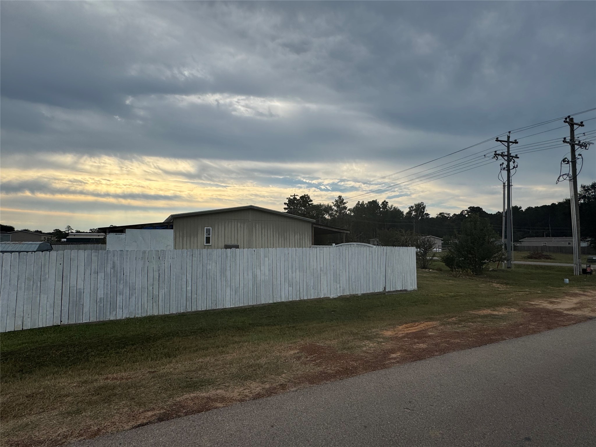 17675 Highway 105 Conroe, TX 77306 - Photo 5 of 6 a view of a backyard of the house