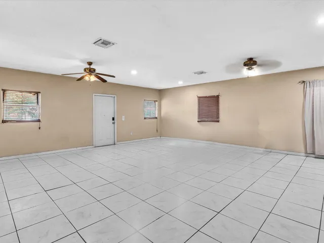 a view of backyard of a house