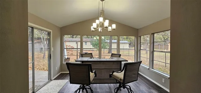 a dining room with furniture window wooden floor