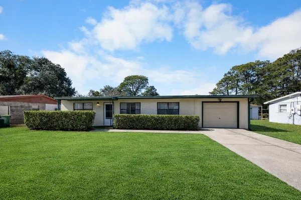front view of a house and a yard
