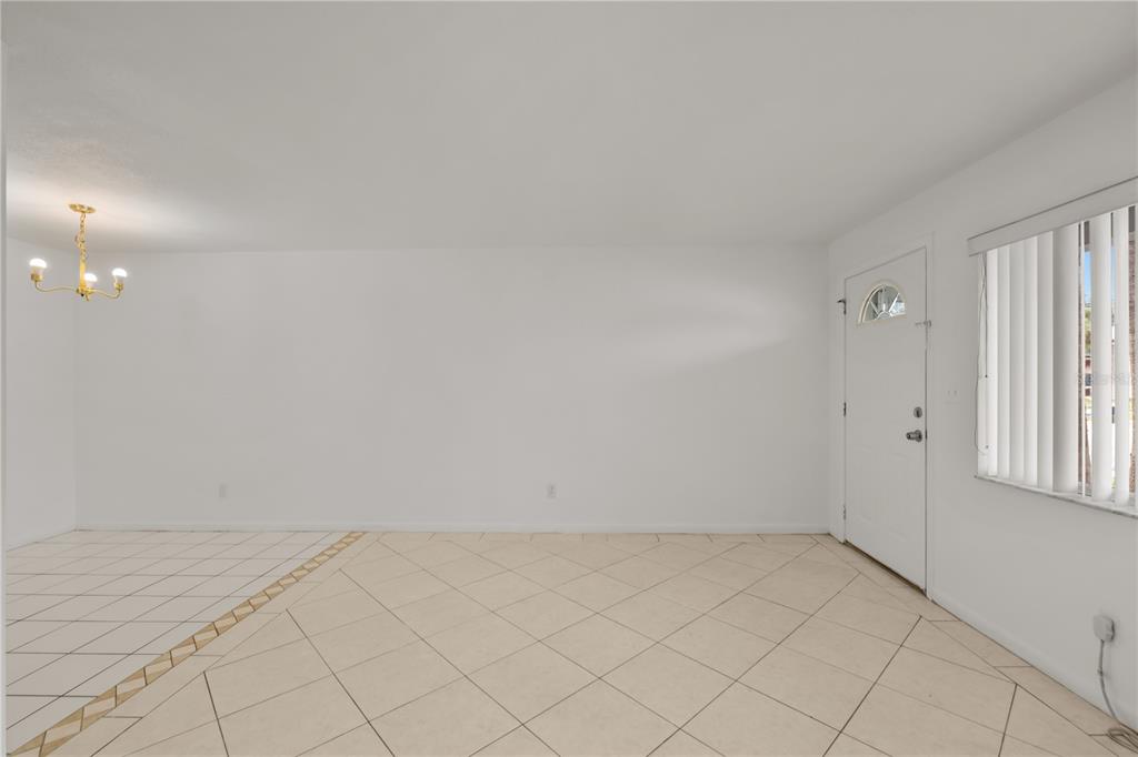 2353 Shelley Street, Unit 5 Clearwater, FL 33765 - Photo 12 of 21 wooden floor in an empty room
