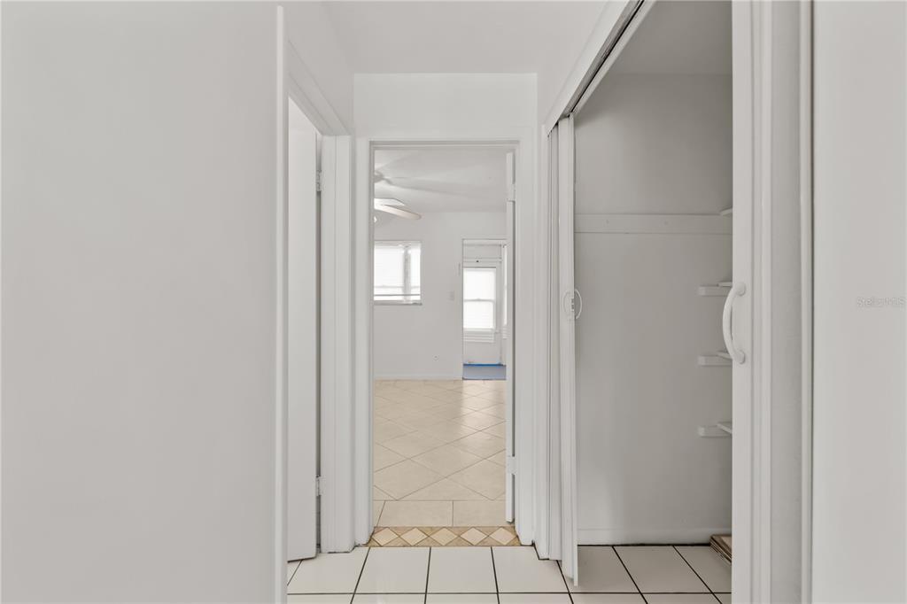 2353 Shelley Street, Unit 5 Clearwater, FL 33765 - Photo 14 of 21 a bathroom with a glass shower door