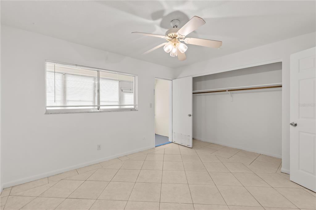 2353 Shelley Street, Unit 5 Clearwater, FL 33765 - Photo 18 of 21 a view of an empty room with a window