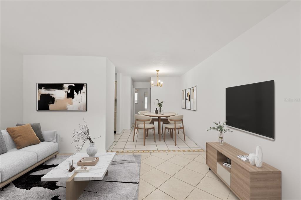 2353 Shelley Street, Unit 5 Clearwater, FL 33765 - Photo 3 of 21 a living room with furniture and a flat screen tv