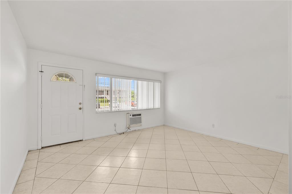2353 Shelley Street, Unit 5 Clearwater, FL 33765 - Photo 9 of 21 an empty room with windows