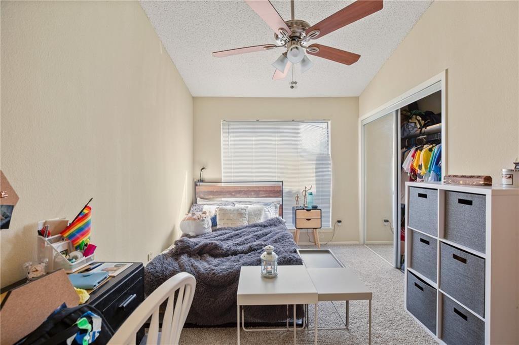 806 West 24th Street, Unit 228 Austin, TX 78705 - Photo 4 of 6 a view of a workspace with furniture