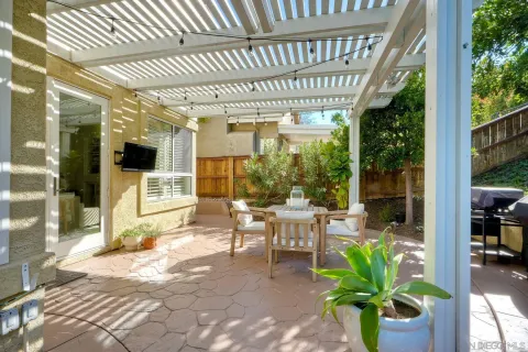 a outdoor living space with furniture and garden view