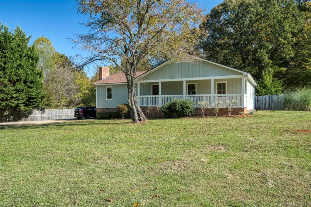 18100 Barnhardt Road Davidson, NC 28036 - Photo 2 of 29 a front view of house with yard and green space
