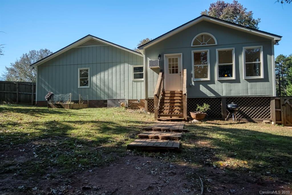18100 Barnhardt Road Davidson, NC 28036 - Photo 22 of 29 a view of a house with a yard