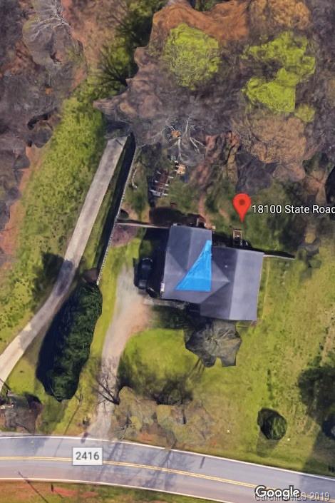 18100 Barnhardt Road Davidson, NC 28036 - Photo 27 of 29 a view of a yard with an outdoor space