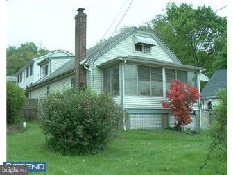 767 Mount Road Aston, PA 19014 - Photo 1 of 6 a front view of a house with a garden