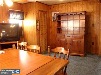 767 Mount Road Aston, PA 19014 - Photo 3 of 6 a balcony with table and chairs