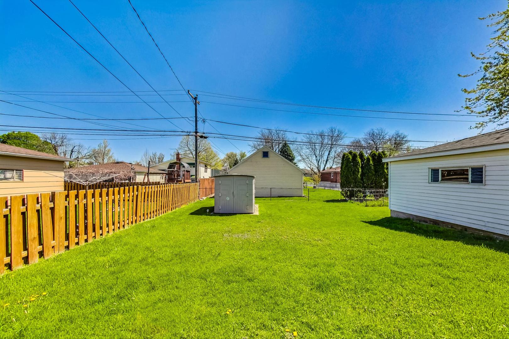 509 North Willow Road Elmhurst, IL 60126 - Photo 24 of 26 a view of a house with a yard