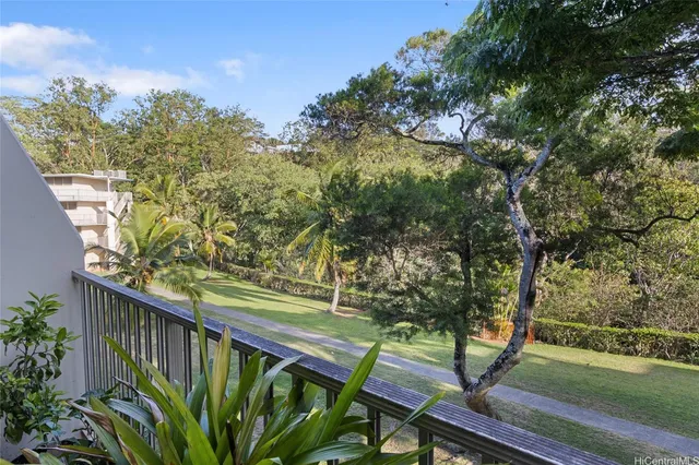 a view of parking with cars