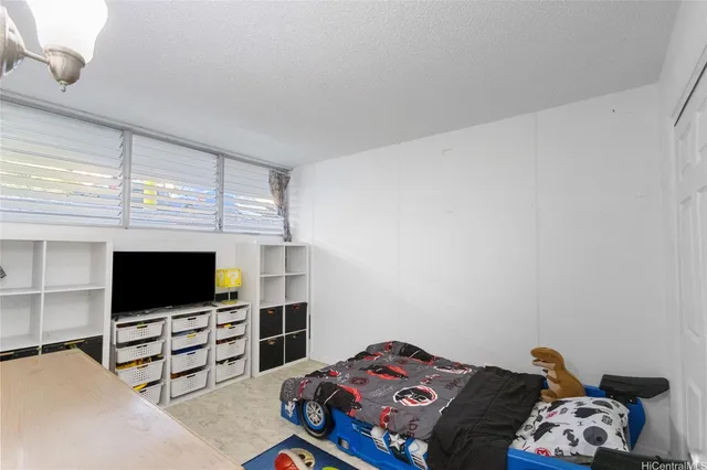 a view of a balcony with a tree