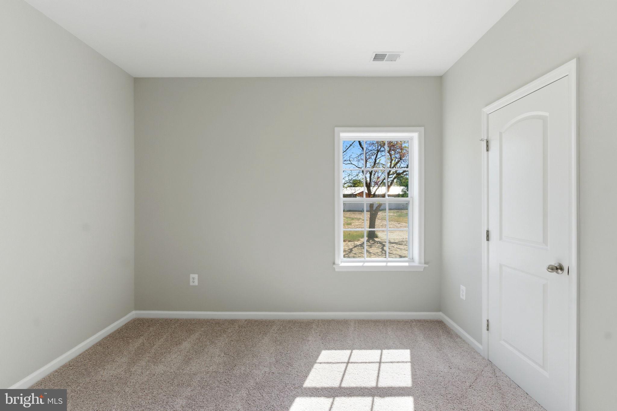 152 General Lee Avenue Inwood, WV 25428 - Photo 19 of 47 an empty room with windows