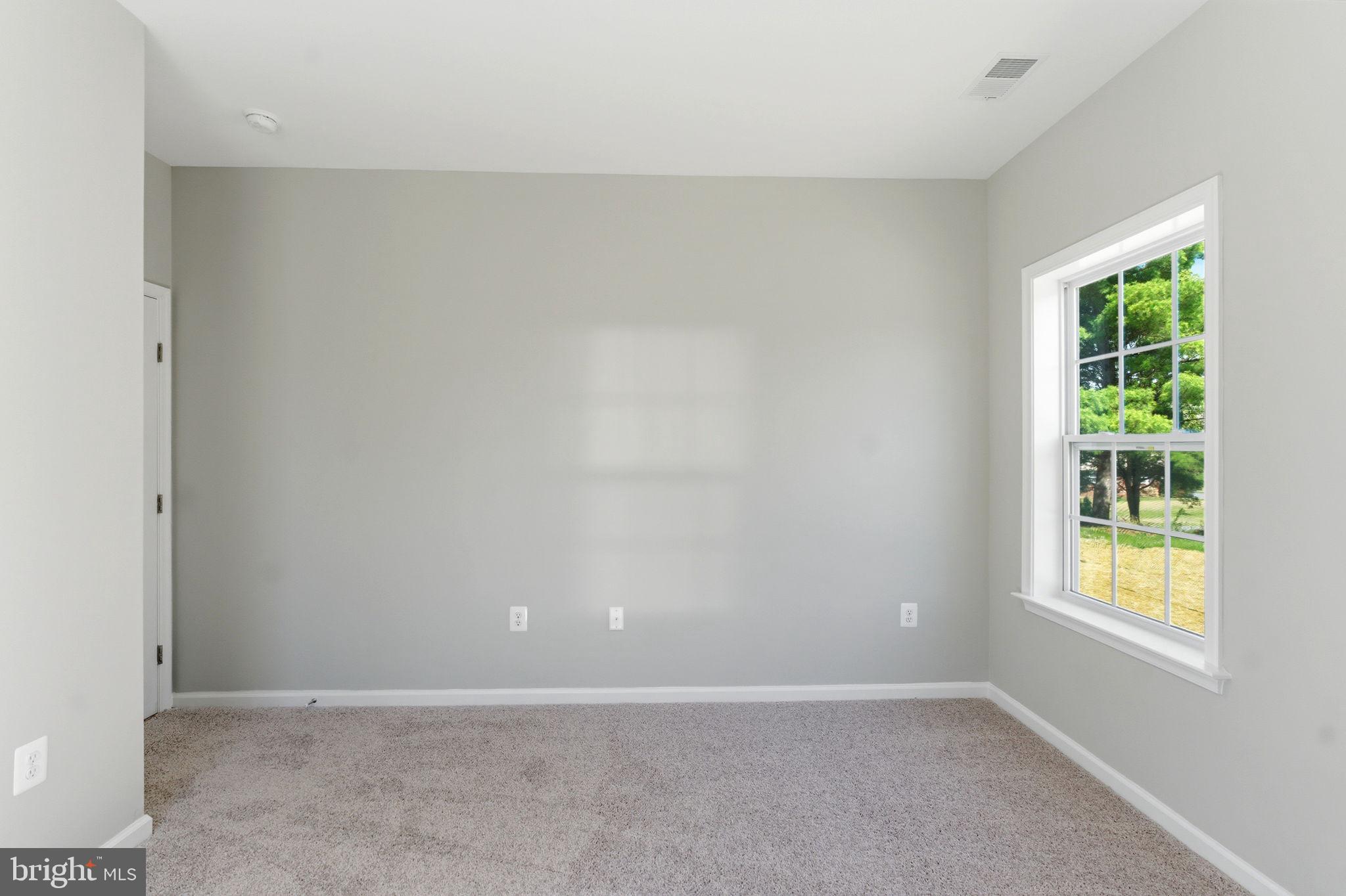 152 General Lee Avenue Inwood, WV 25428 - Photo 20 of 47 an empty room with windows