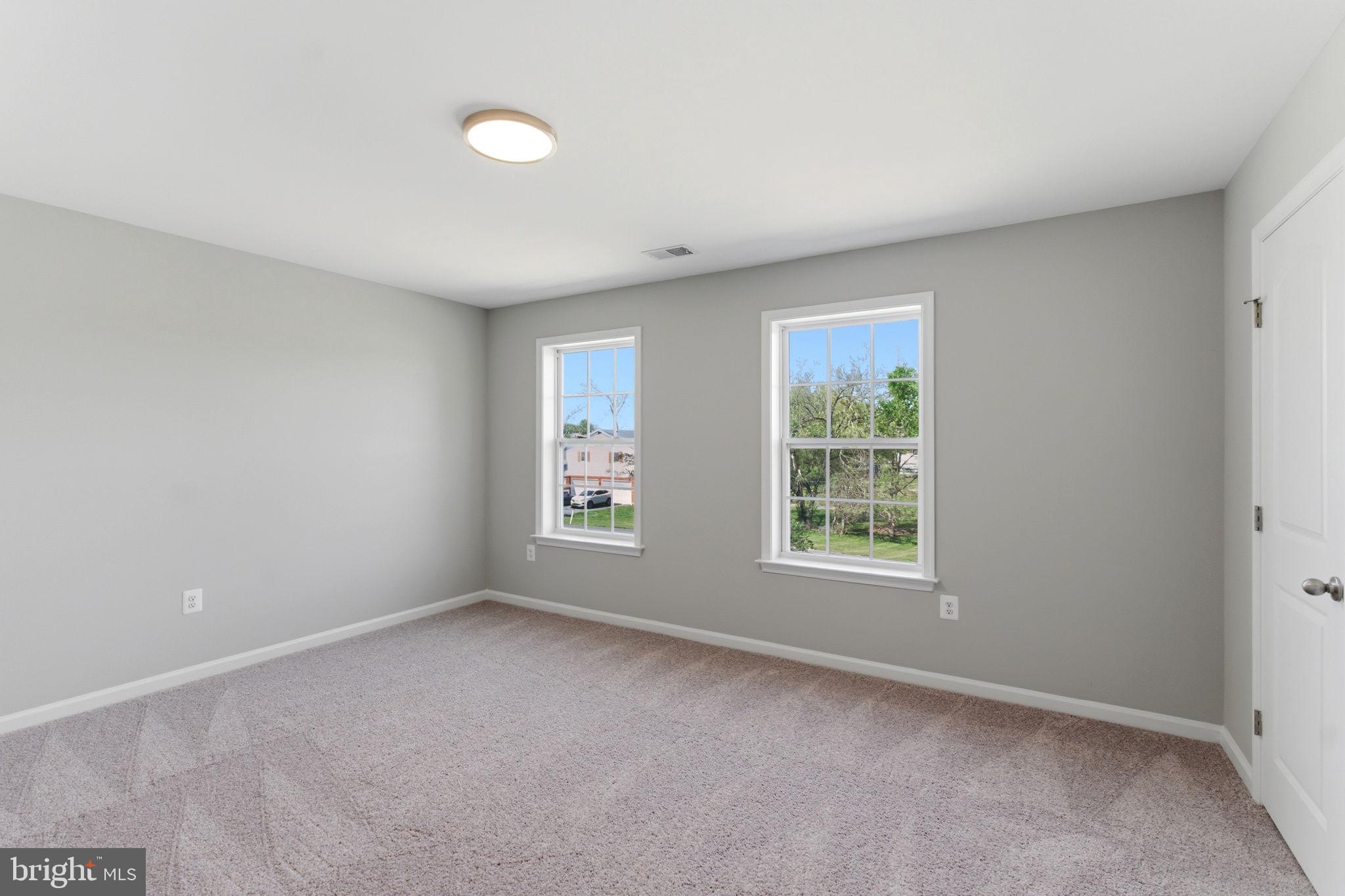 152 General Lee Avenue Inwood, WV 25428 - Photo 21 of 47 an empty room with windows