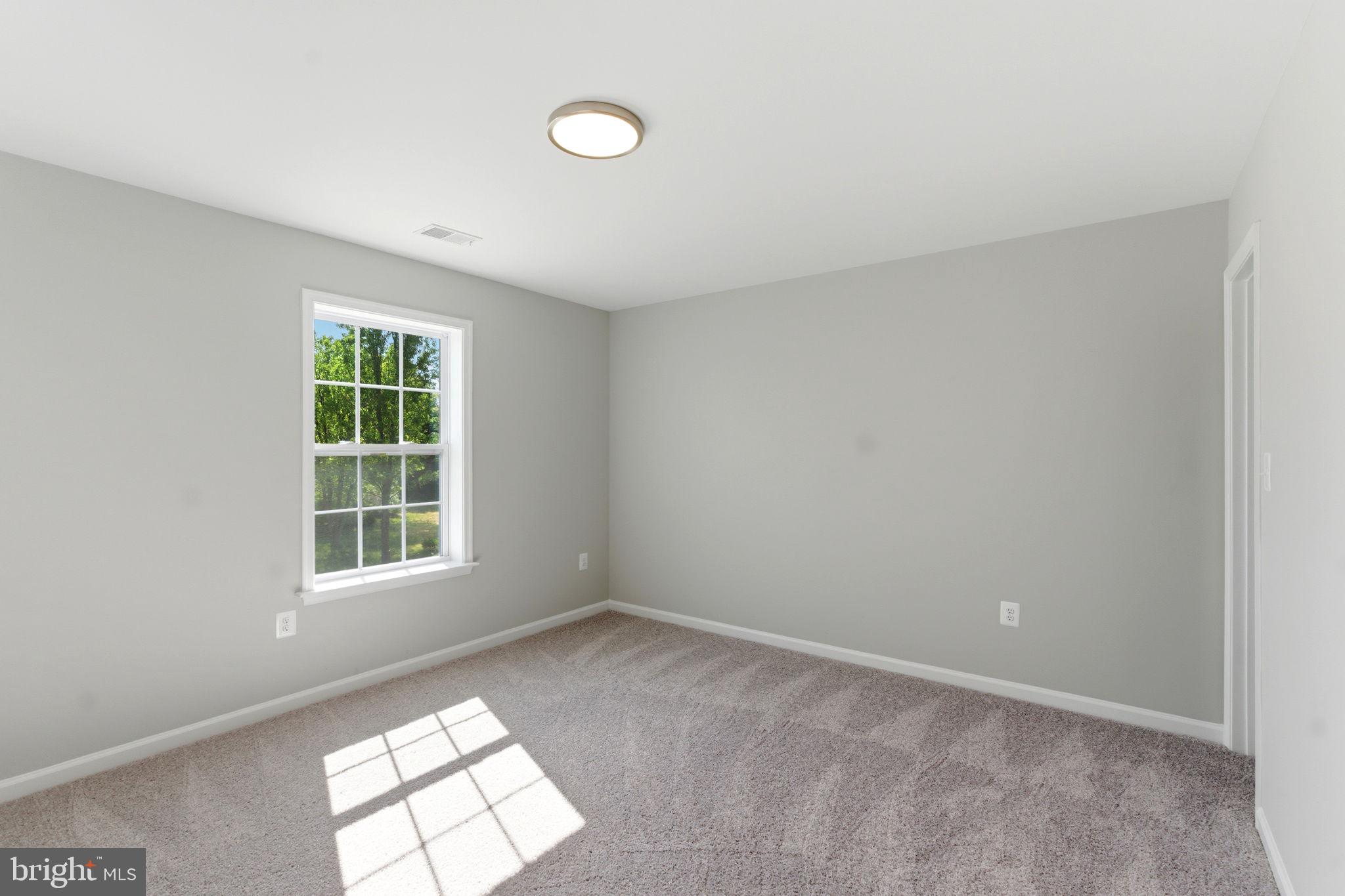 152 General Lee Avenue Inwood, WV 25428 - Photo 24 of 47 an empty room with windows